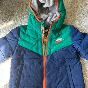 Boys Nike Navy Blue and Green Puffer with Orange Trim